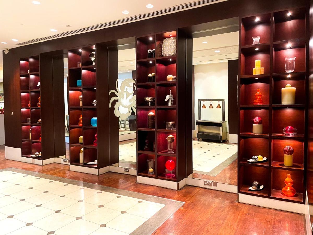 Moevenpick Grand Al Bustan Hotel Dubai Exterior foto The interior of the hotel