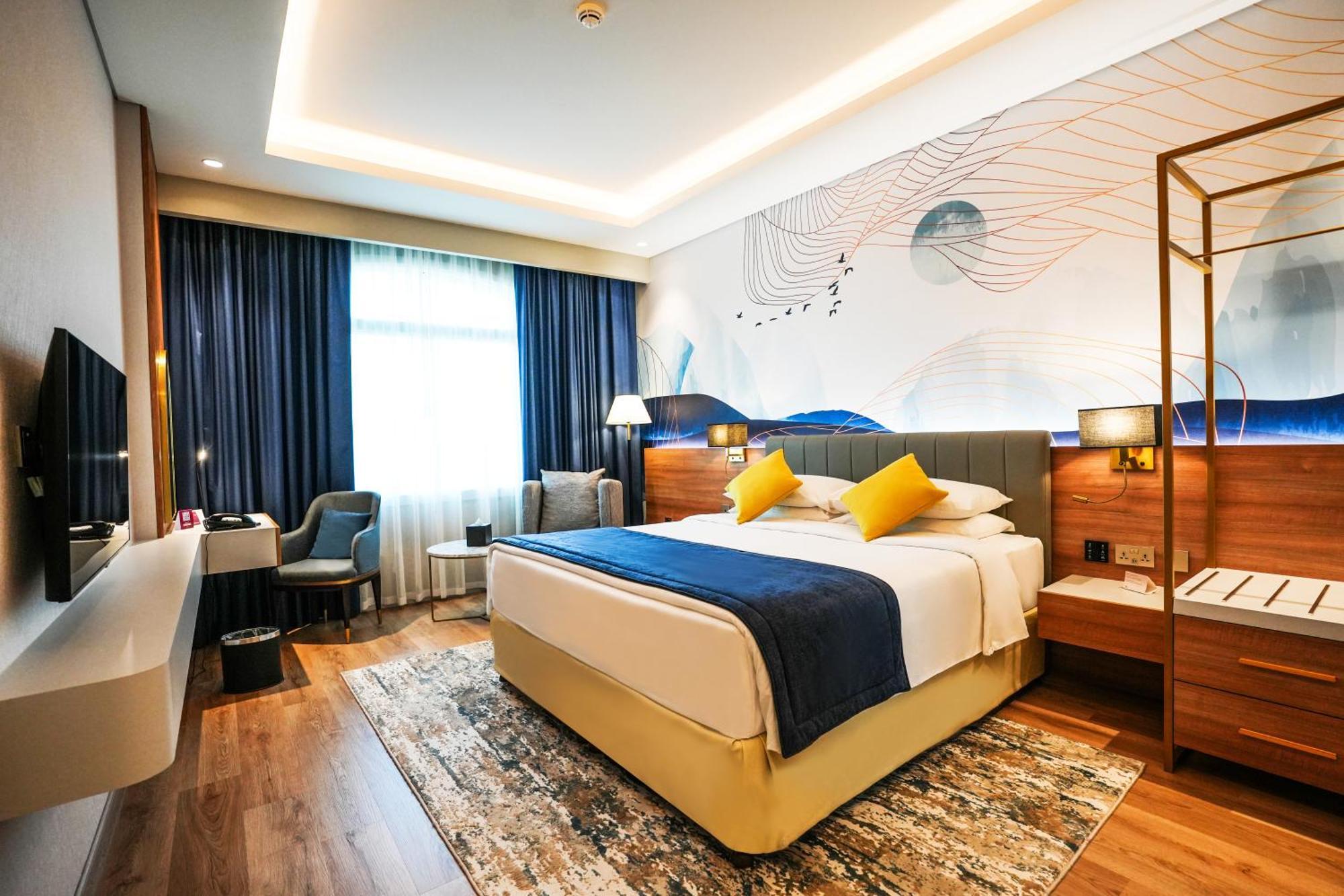Moevenpick Grand Al Bustan Hotel Dubai Exterior foto Deluxe Room