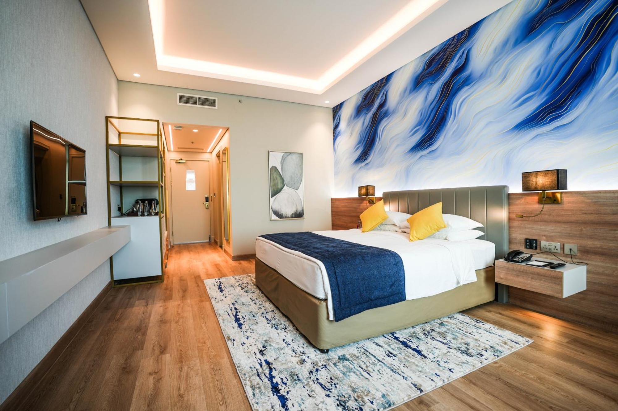 Moevenpick Grand Al Bustan Hotel Dubai Exterior foto Deluxe Room